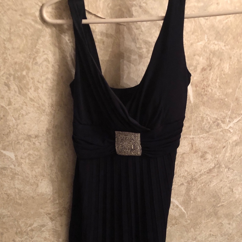 Navy  blue dress, with sequence button